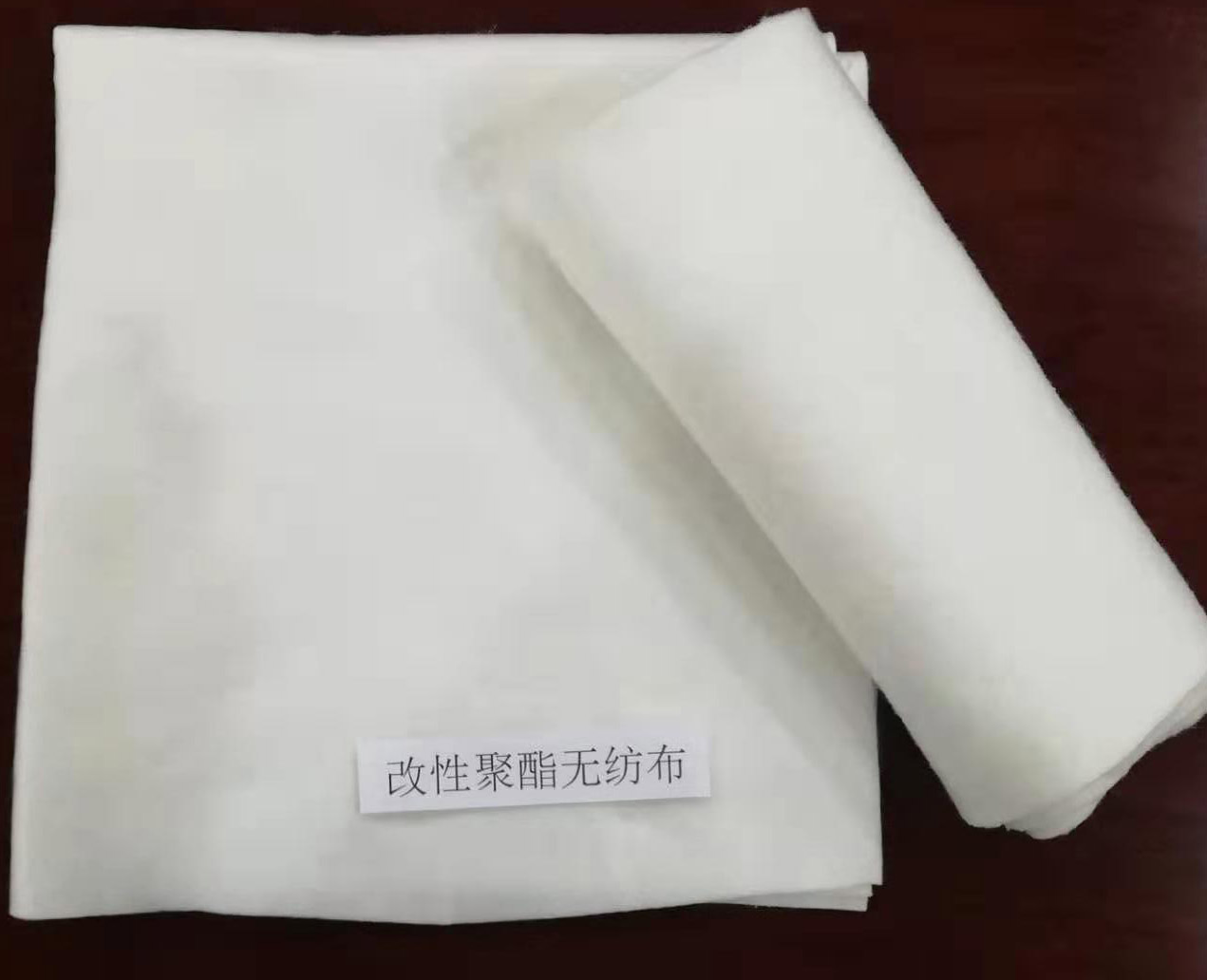 Modified polyester non-woven fabric